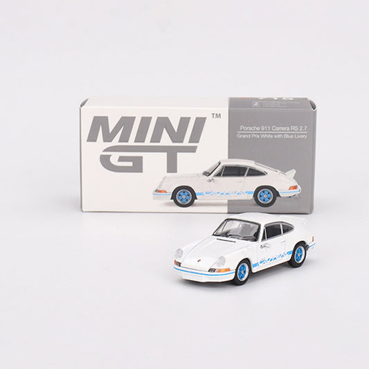 A white Porsche 911 Carrera RS 2.7 diecast model car with blue and black detailing, displayed next to its packaging box which also features the Mini GT branding.